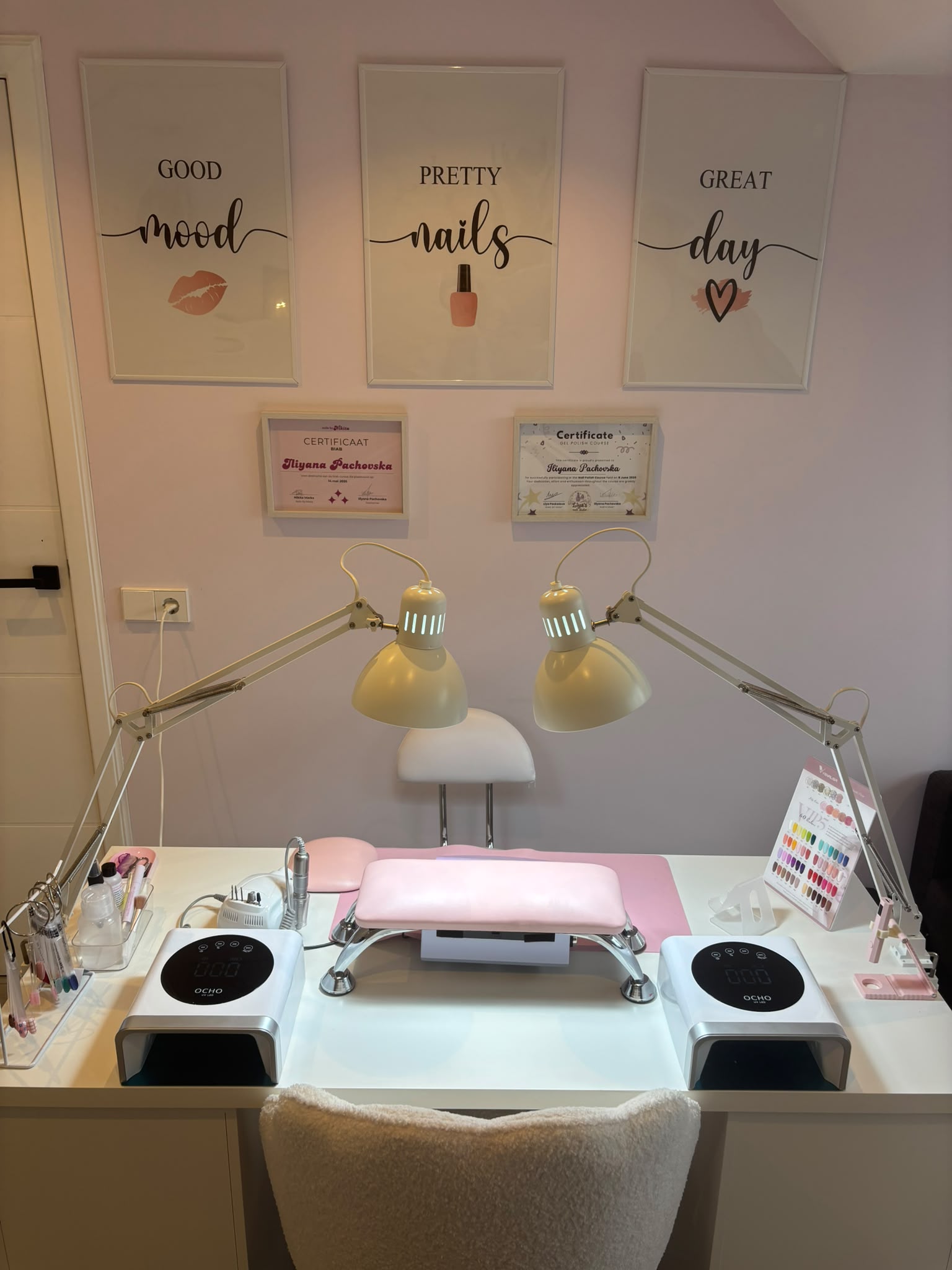A welcoming and relaxing nail studio interior with a manicure table and soft lighting